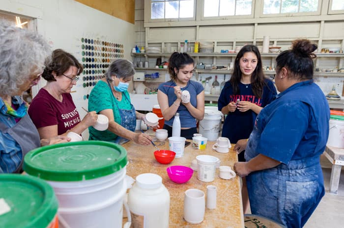 People taking a ceramics class