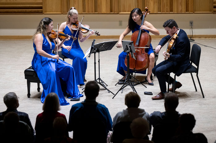 A quartet performing in Lenna Hall