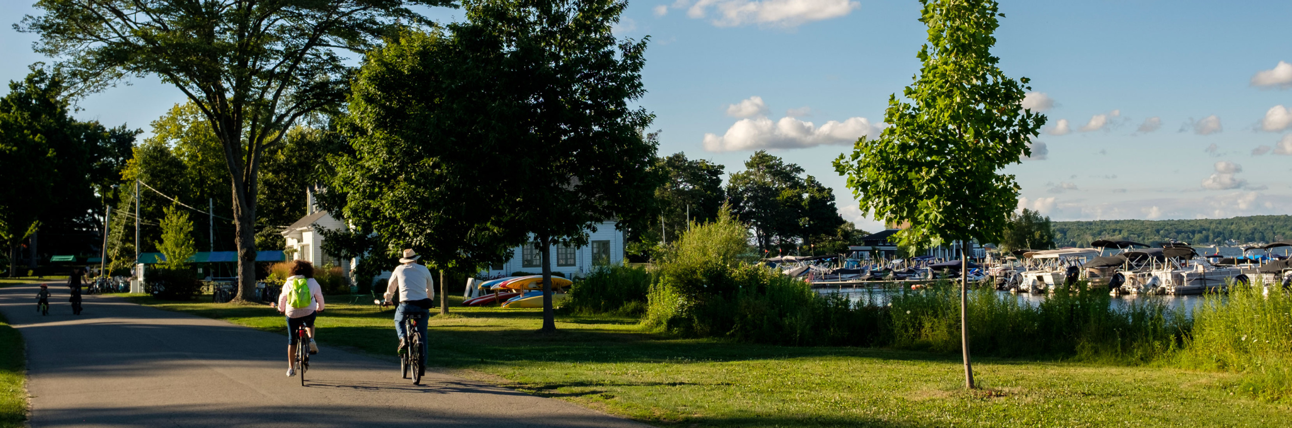 People riding bikes near Chautauqua Lake