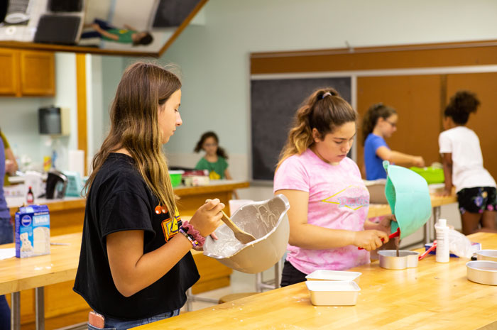 Girls in a baking class 