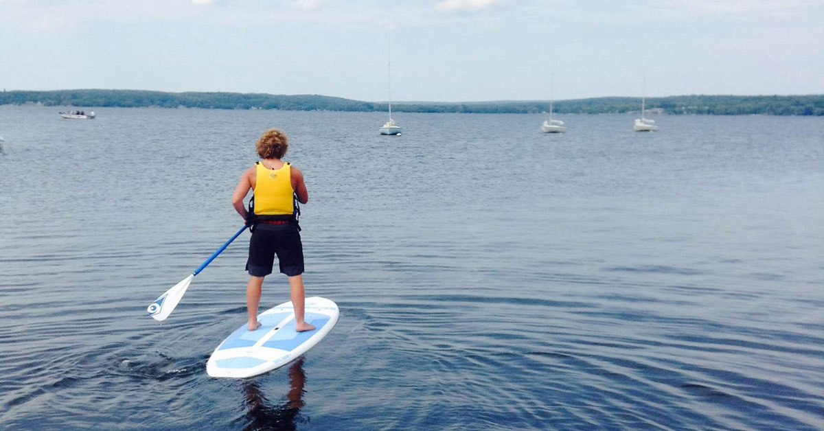 A man on a stand up paddleboard