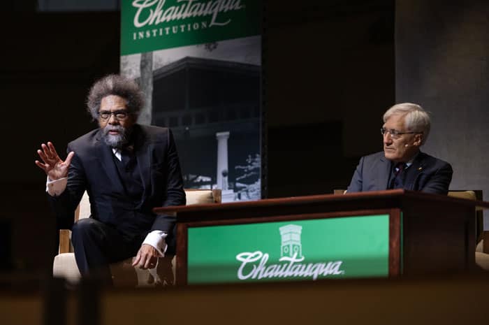 Cornell West speaking during his lecture with Robert George