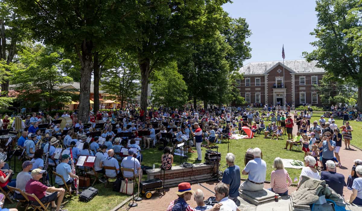 Chautauquans gathered in Bestor Plaza listening to the Community Band playing on the Fourth of July.
