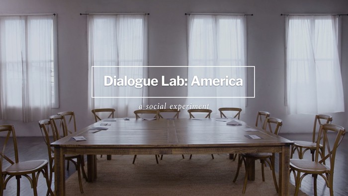 Dialogue Lab: America over a photo of empty chairs sitting around a table