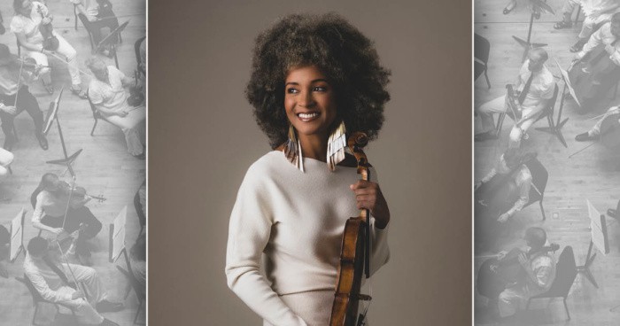 Melissa White holding a violin