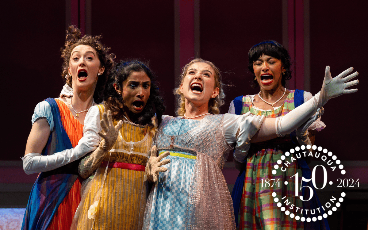Four women with shocked faces during a production of Pride and Prejudice