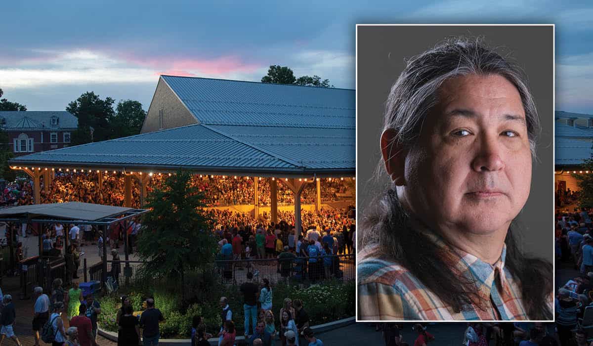 Joe Futral's headshot over a night time photo of people in the Amphitheater for an evening concert