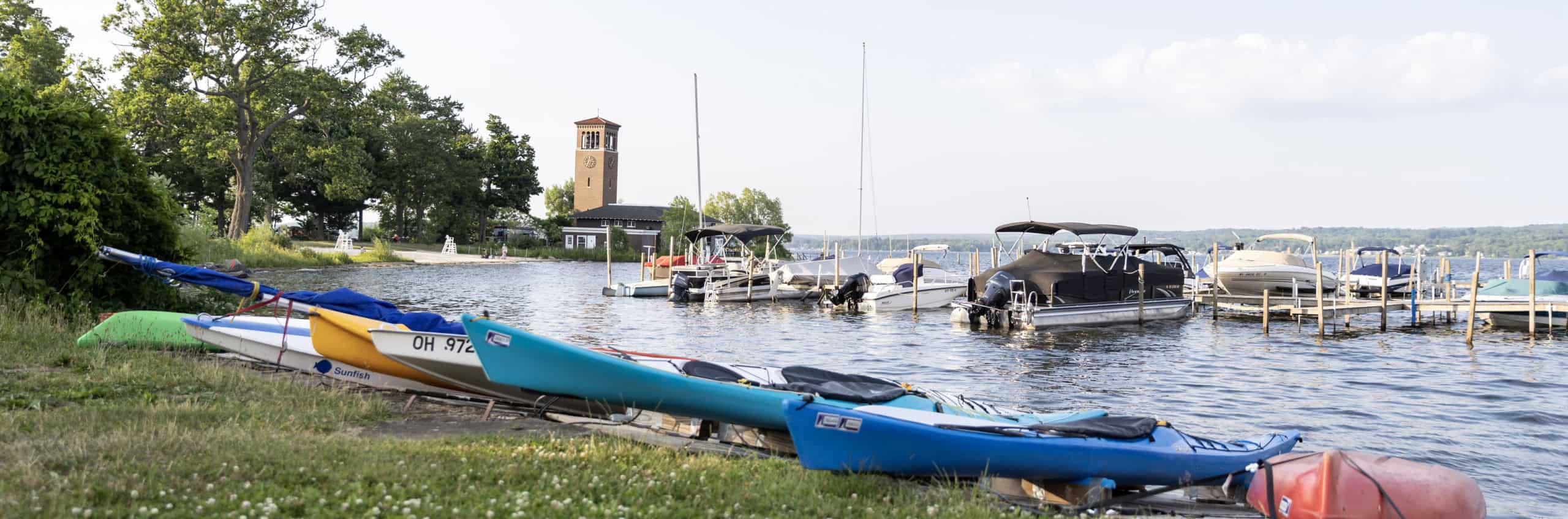 Kayaks and boats along Chautauqua Lake
