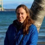 Allison Hrycik in a blue coat near water