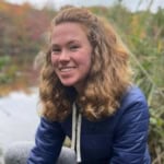 Claire McMahon near a lake