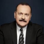 Harry Kolar in a black suit