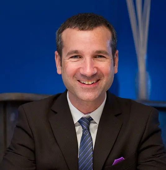 Javier Corrales' headshot