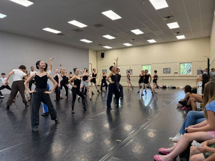 Students watching dancers in the studio