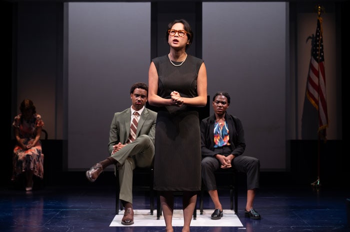 Actors in a court room set
