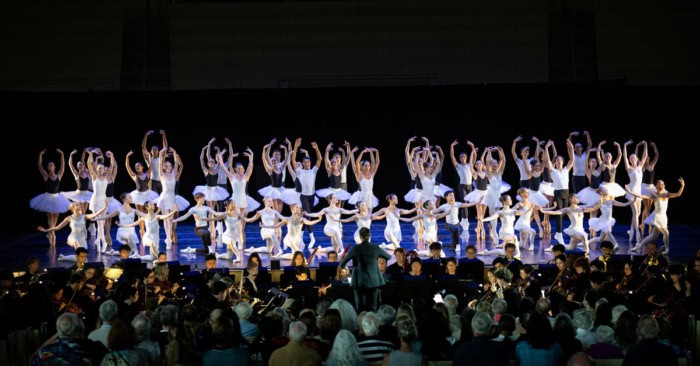 The School of Dance and MSFO performing together in the Amphitheater