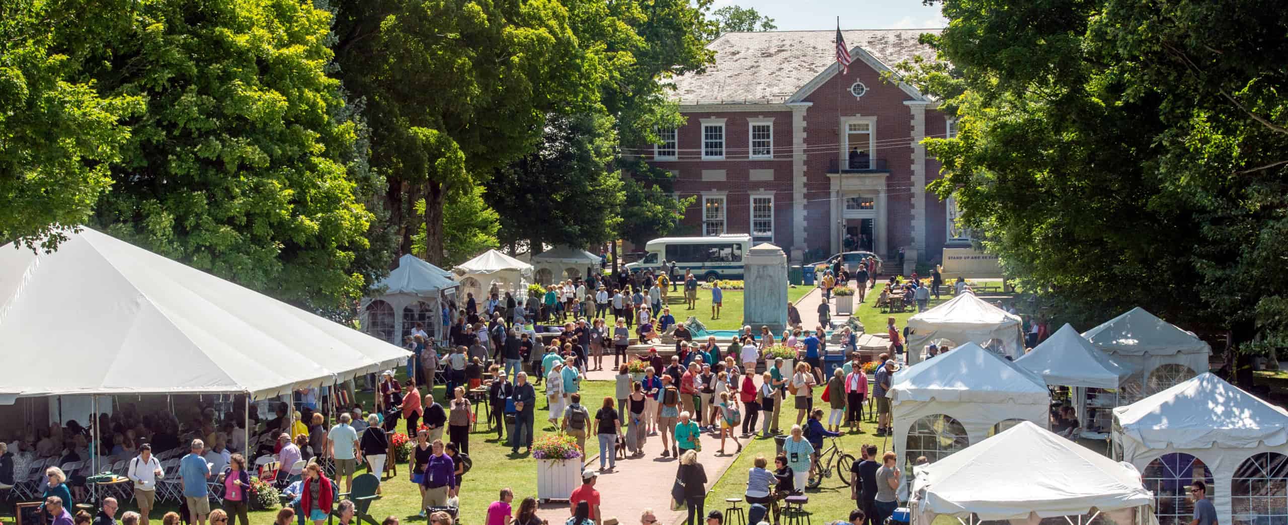 A crowd of people and tents in Bestor Plaza during the Food Festival