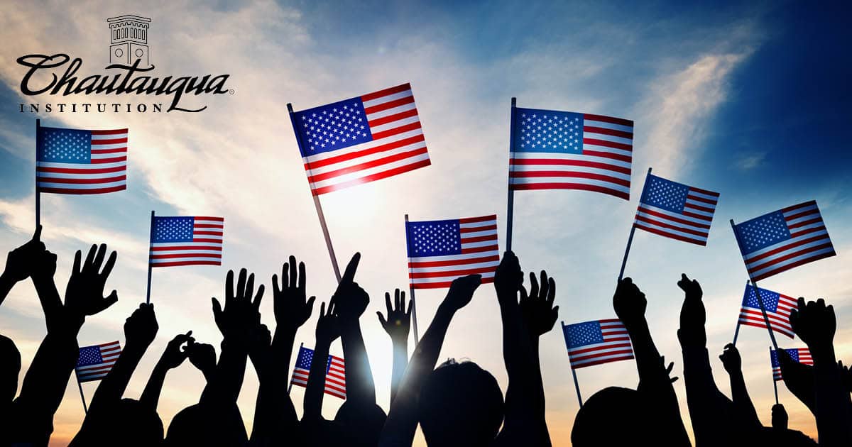 People holding American flags