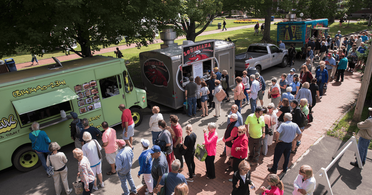 People in line at food trucks